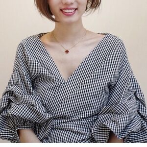 Asymmetrical wrap top